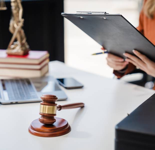 In Asian legal compliance, faculty of law, legal counseling office, female lawyer reads a contract
